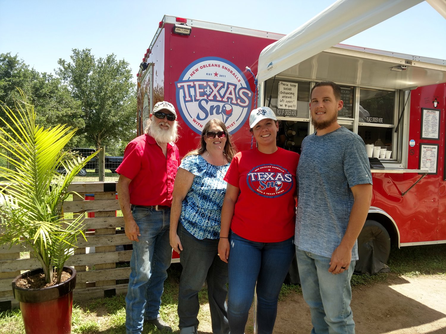 Texas Sno is a family-owned business that offers a variety of flavors in their sno cones, including some dye-free flavors. The dessert food trailer offers treats from its location at ErmaRose Winery. Pictured from left to right are owners Giles Debenport, Kristen Debenport, Kelsie Dartayet and Travis Debenport. Texas Sno can be reached at 346-377-9436 or visit them online at www.texassno.com.